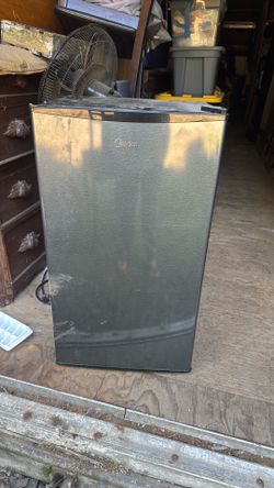 Midi small fridge with small freezer.