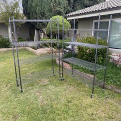 Metal Racks With Wheels 2 units Available asking $150 for both