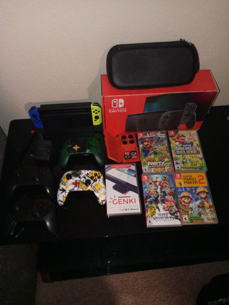 Big Nintendo switch bundle 8 Games, 4 Wireless controllers, +extras 