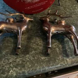 Silver tone set of 2 Deer candlestick holders reindeer. very heavy and well maintained