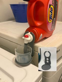 Laundry detergent cup holder