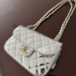 Vintage silver chanel bag