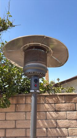 Patio heater. A little bend. Works $35 or best offer