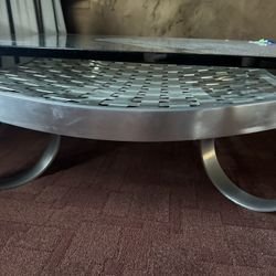 High- End Stainless Glass Coffee Table - Excellent Condition (Very Heavy) 48” x 48” - Retail: $3400.     
