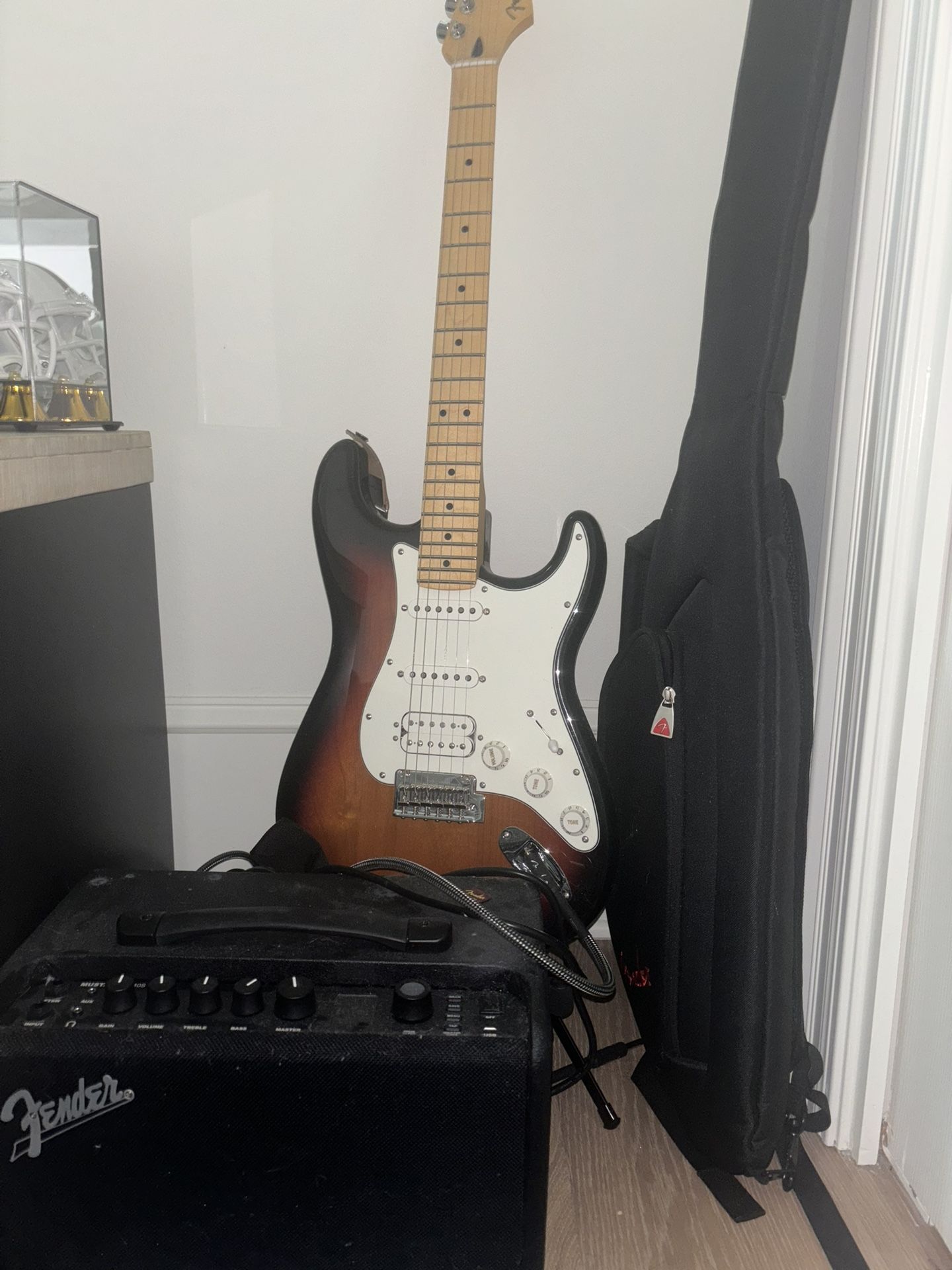 Fender Stratocaster (Case stand and picks) with Fender Mustang LT40S Amp