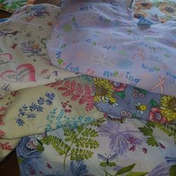 Size L  SCRUB TOPS.  5 For 15.00 