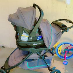 Stroller with baby carrier and base for sale