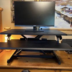 Standing desk, monitor and mouse