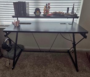 Desk with shelf, plug, storage and hanger