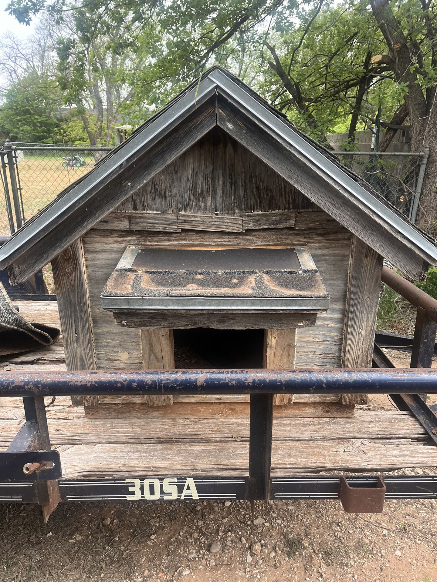Well-Built Wooden Doghouse 