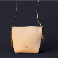 Genuine COACH Neutral Leather Cross Body dufflette Handbag.