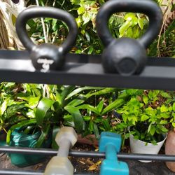 KETTLEBELLS. :  9 lbs.  &  17 lbs.   PLUS  PAIR OF  RUBBER  :  10  POUND. DUMBBELLS 