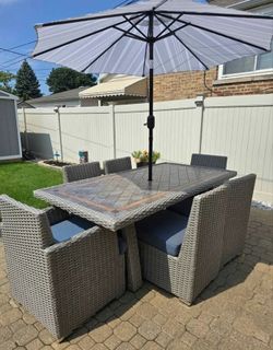 Niko Sectional Conversation Sets, the elegant Niko 7-piece Dining patio Set by
