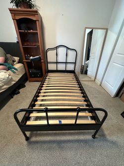 Metal twin bed