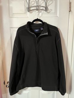 Men’s Black Size Large long sleeve pull over shirt.  Made of 100% Polyester.  Brand The Gap.  Preowned very good condition.  Smoke free home
