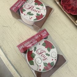 Peace And Joy Sandstone Coasters In Wooden Caddies. Two Sets Of Four Each. $20 For Both Sets.