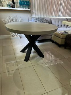 Gray concrete dining table