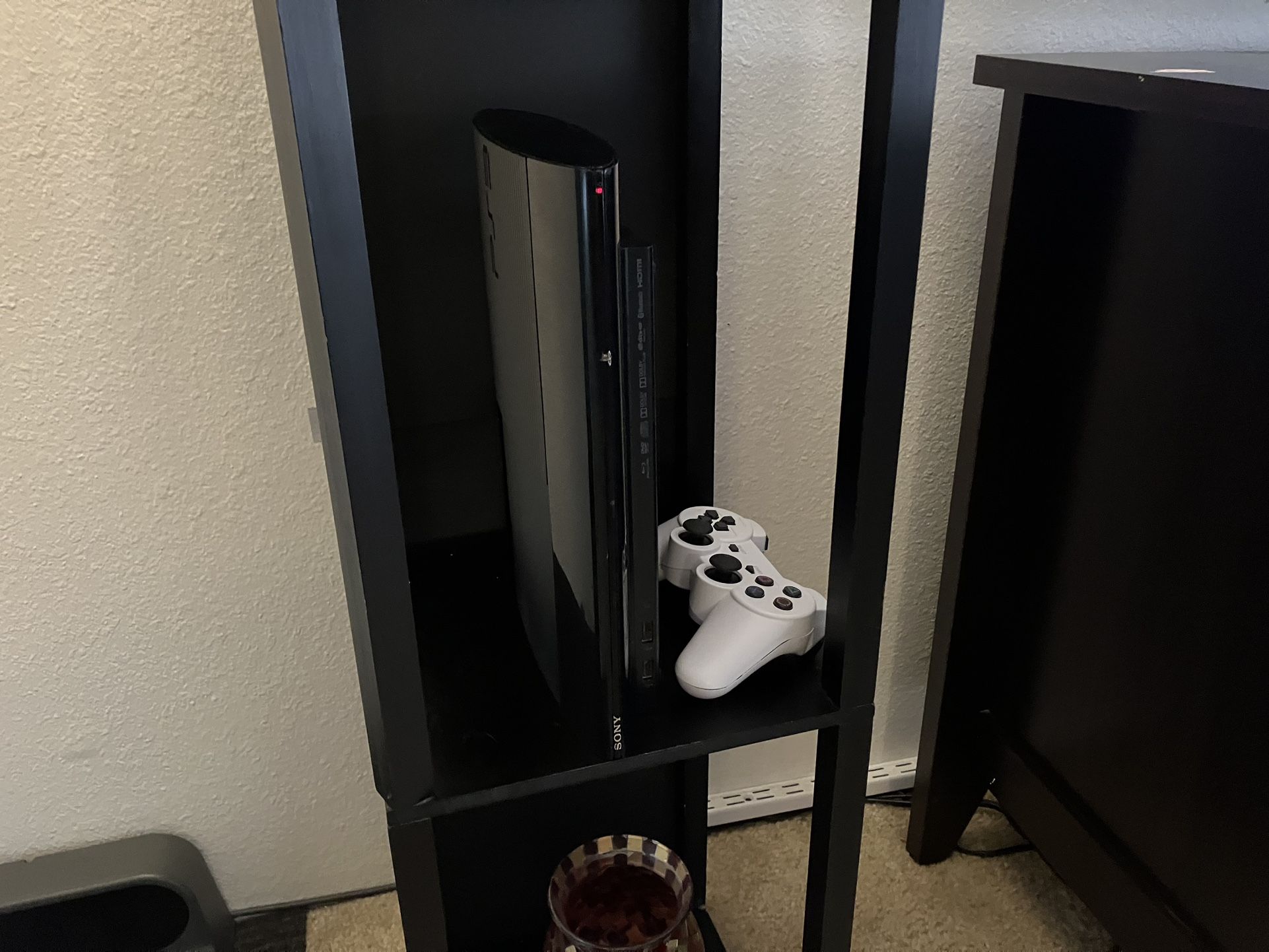 PlayStation 3 (super Slim) W/controller + 16 Games