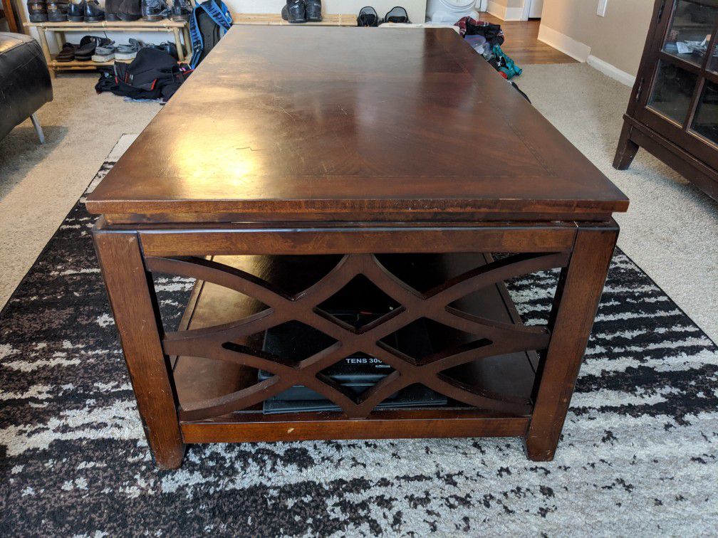 Dark wood coffee table, side tables and entertainment system