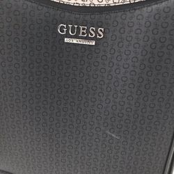 Guess situate suitcase