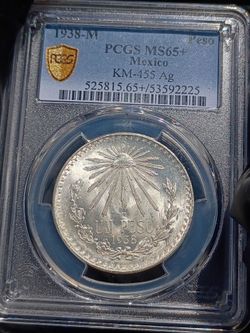 1938 pcgs ms65+ un peso Mexican coin