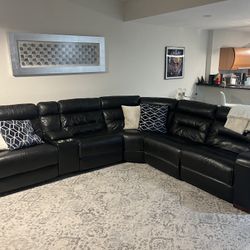 Black leather Sofa With recliner Seats 