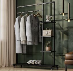 Rolling Garment Rack with Shelves $100.00 (MSRP $129.99) OBO