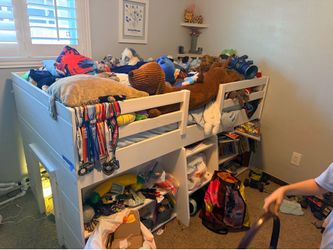 Twin Loft Bed With Built-In Bookshelves and Play Space