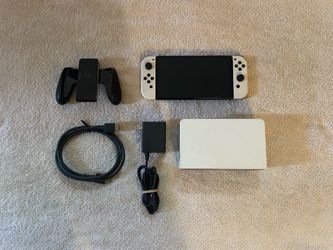 NINTENDO SWITCH OLED VERSION