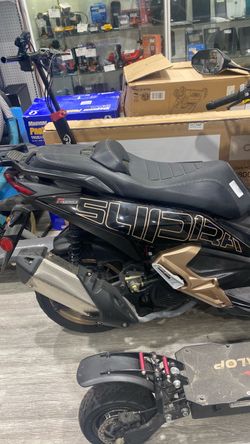 Black Motor Scooter / Moped