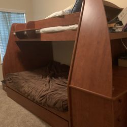 Berg’s bunk bed with built in study table, 3-stair drawers and an optional trundle bed.
