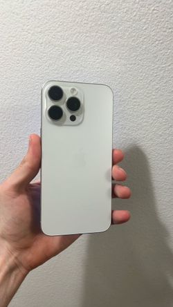 Apple iPhone 15 pro max 256gb unlock no SIM card restrictions white color small chip on the top from screen other than that perfect and low use