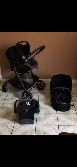 LIKE NEW EVENFLO PIVOT MODULAR TRAVEL SYSTEM STROLLER CAR SEAT AND BASSINET 3 IN 1