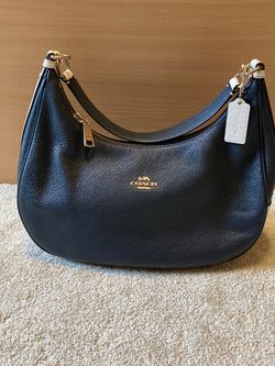 Coach Harley Hobo in a colorblock navy and ivory (or cream) leather. Like new