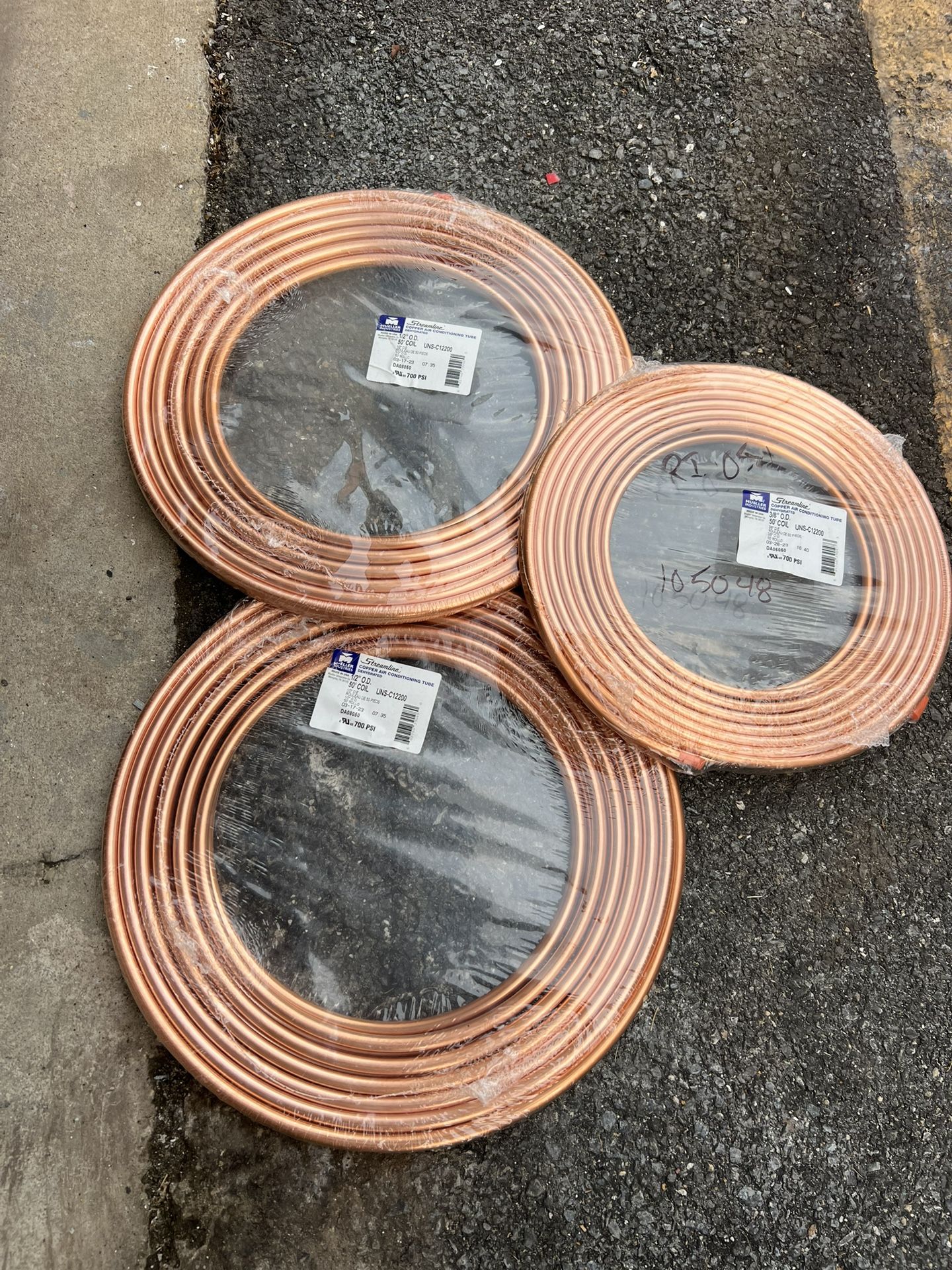 3/8”and 1/2” copper air conditioning tube 3 rolls 50 feet each