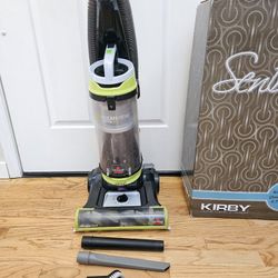 New Cond.   Vacuum With ATTACHMENT  , WORKS EXCELLENT  , AMAZING POWER SUCES.    IN THE BOX 