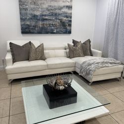 Sofa , Coffee Table And Wall Art