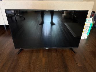 Samsung Series 6 43-inch Class 4K UHD LED Smart TV with remote