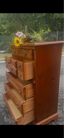 Solid wood tall chest with big drawers. Drawers sliding smoothly