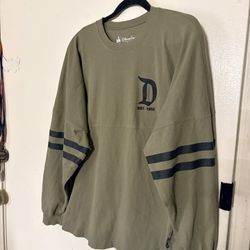 Disneyland Resort olive green long-sleeve shirt. 