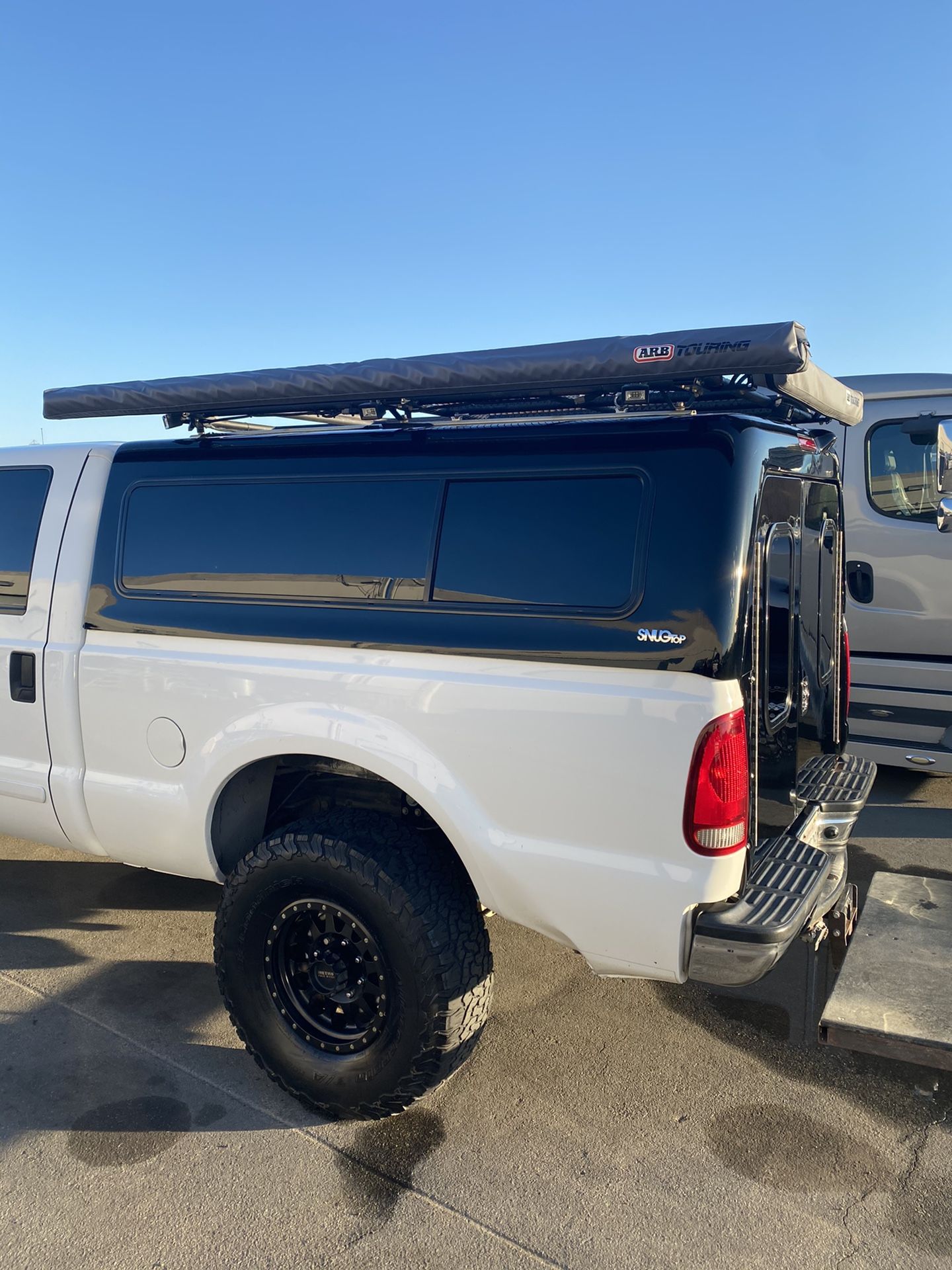 Snugtop Outback Camper shell with roof rack and drawer system