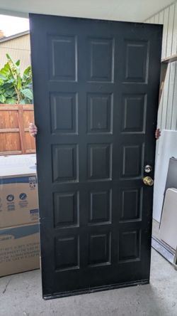 Black 15-Panel Exterior Door with Brass Knob
