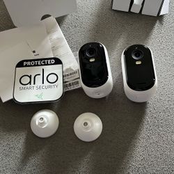 2 Arlo Outdoor Cameras 