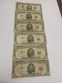 I have six collectible notes, five red and one green, each worth five dollars. I'm asking for 25 for each one.