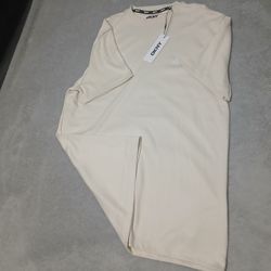 DKNY cream t-shirt, brand new. SIZE L