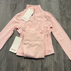 Pink lululemon define jacket and leggings set