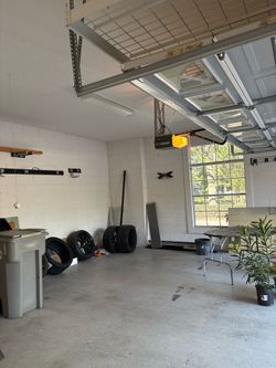 Garage Door Opener Broken Spring Off Track Replace Adjustment And Parts
