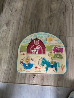 B. Toys Wooden Farm Animal Peg Puzzle