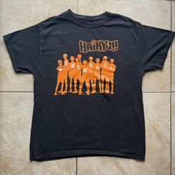 Black Haikyuu!! Anime Tee with orange & white graphic of the lineup. Short sleeve. 
