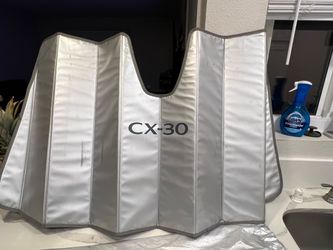 Sun shade/visor for a cx 30